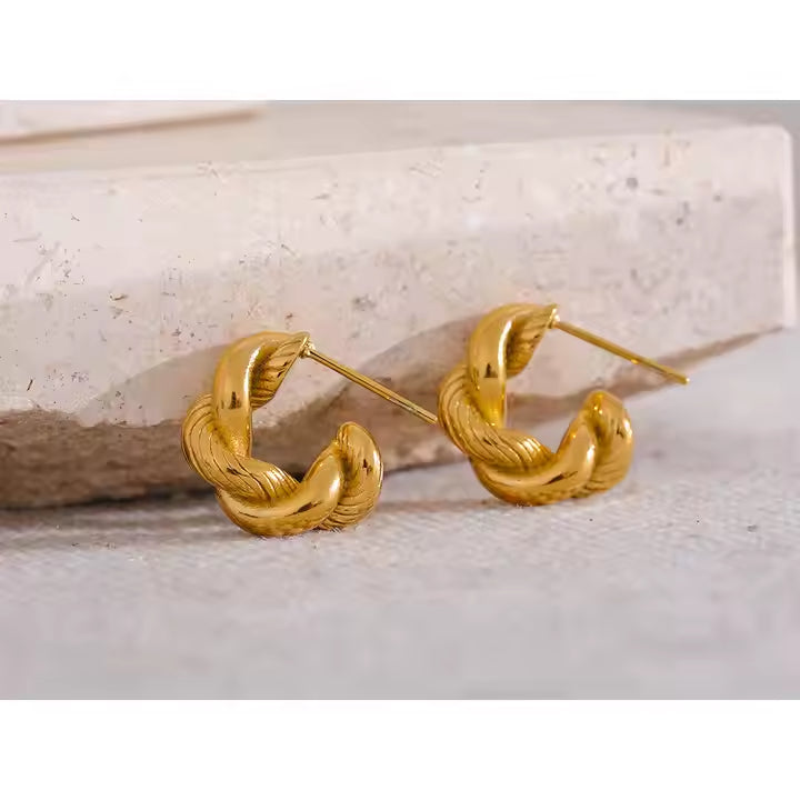 Brincos Argola torcida - Dourado