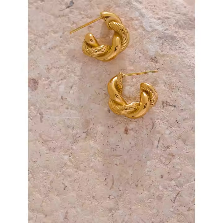 Brincos Argola torcida - Dourado