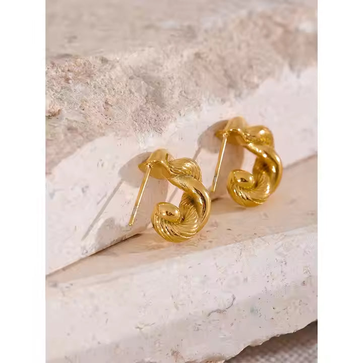 Brincos Argola torcida - Dourado